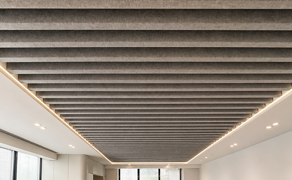 Acoustic PET felt ceiling baffle panels at BIM Headquarters in Denizli Turkey – open-plan office acoustic installation view 3 by FeltVibe
