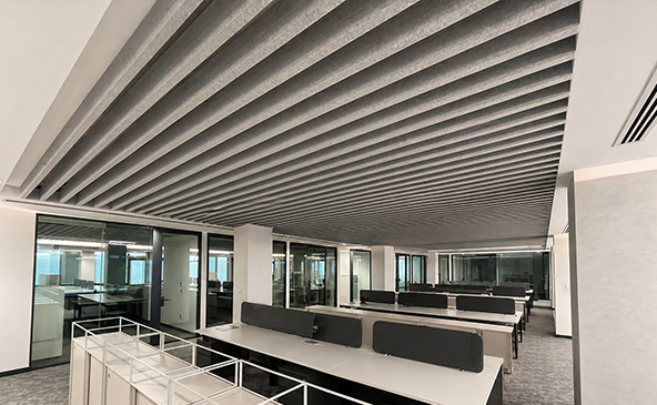 Acoustic PET felt ceiling baffle panels at BIM Headquarters in Denizli Turkey – open-plan office acoustic installation view 4 by FeltVibe